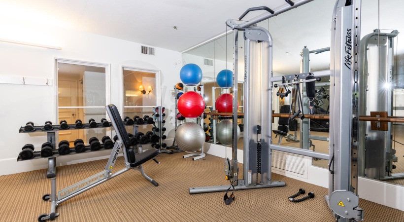 Cutting-edge amenities at your fingertips a room with exercise equipment